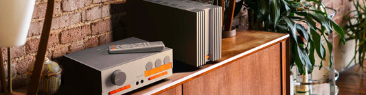 audio components sitting on timber cabinet