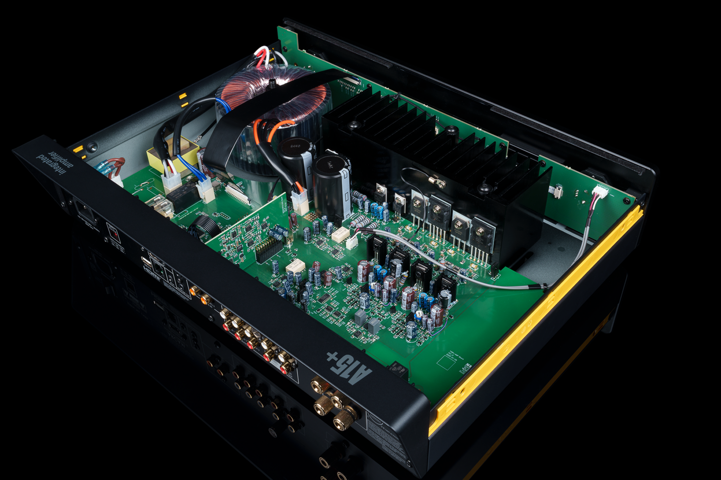 Arcam A15+ Integrated Amplifier internal view of electronic circuit board with various components on a black background