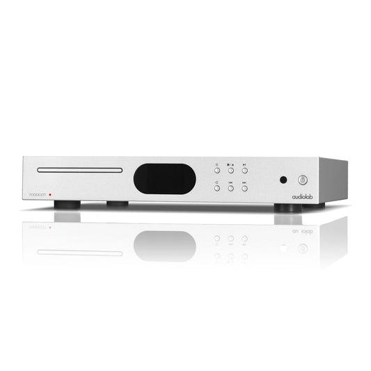 A silver Audiolab 7000CDT CD Transport with a front-loading CD tray and a digital display on the front panel.