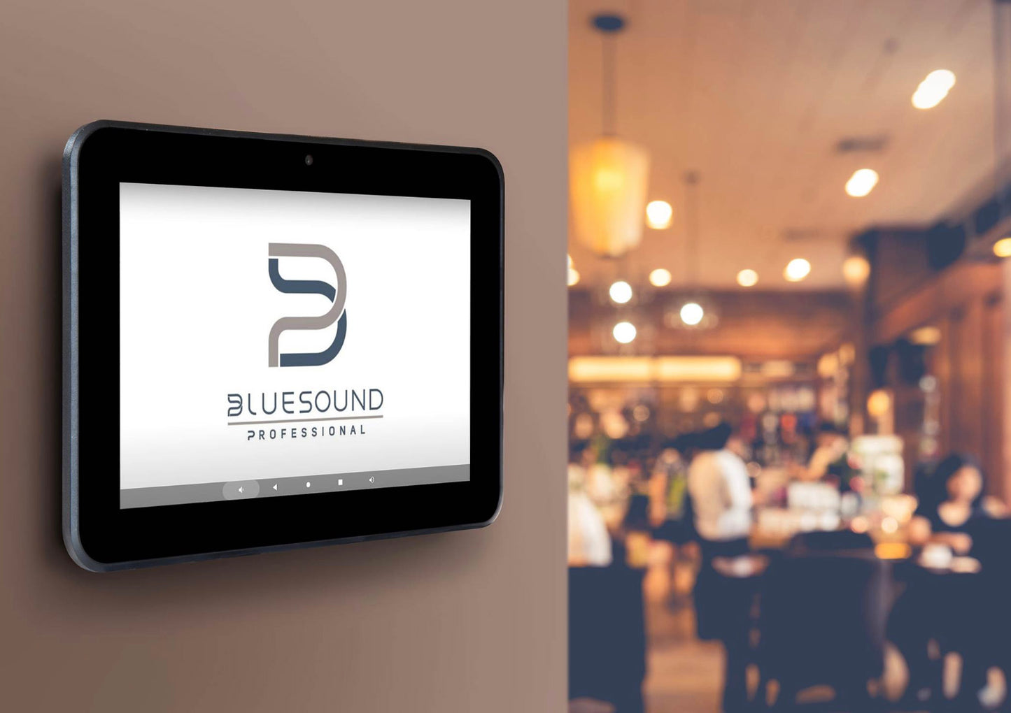 Digital display with Bluesound Professional logo in a restaurant setting