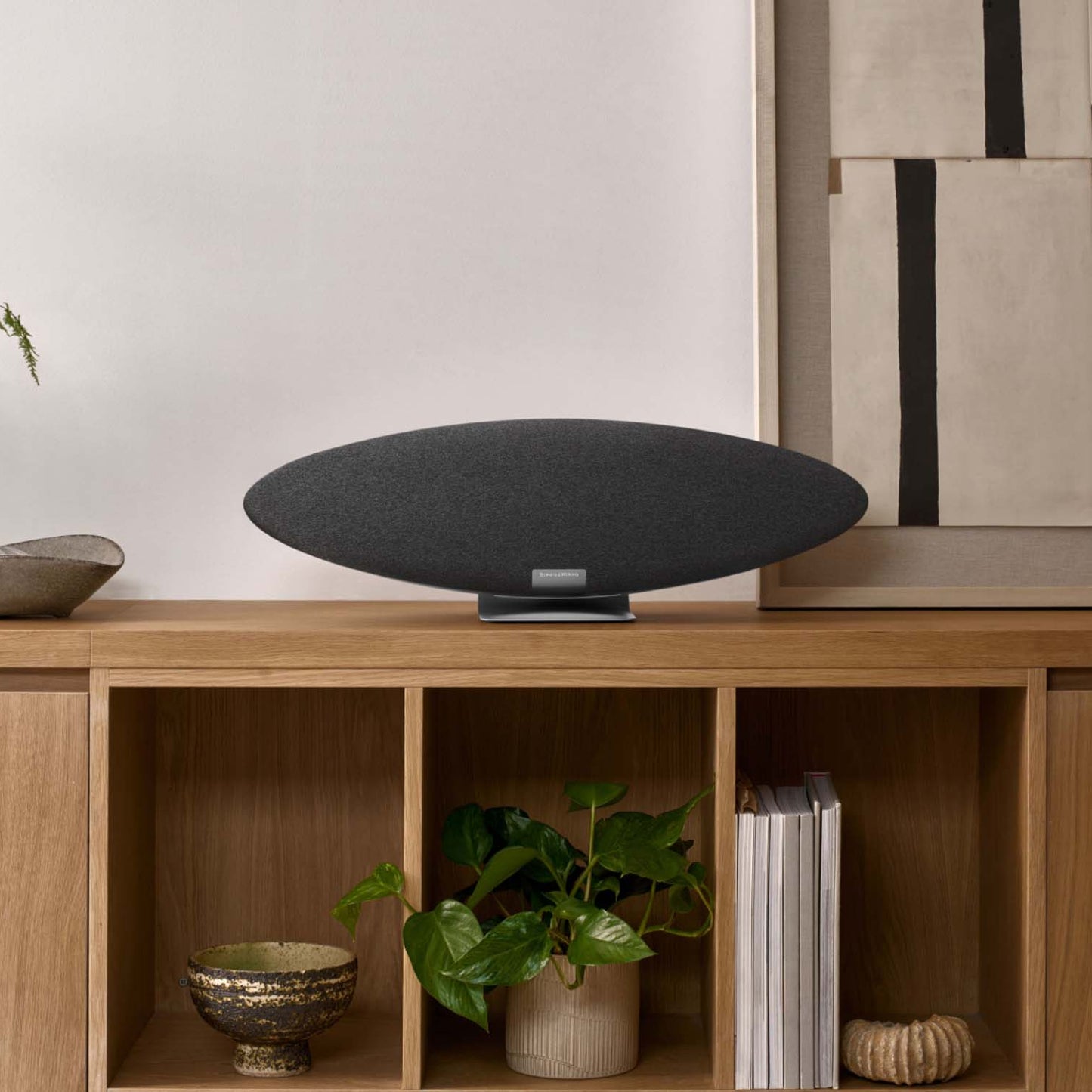 Bowers & Wilkins Zeppelin Pro Edition Streaming System in grey on timber cabinet