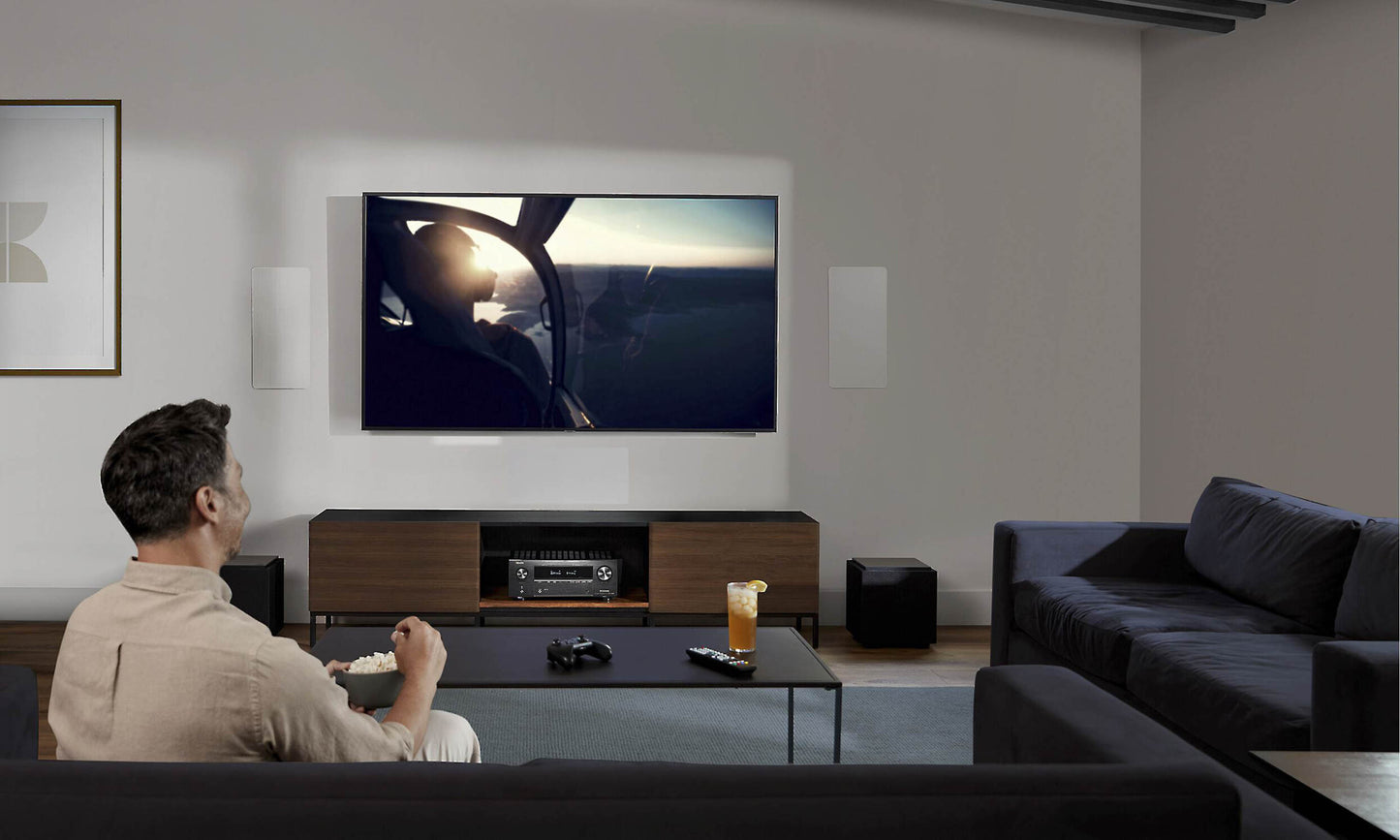 Man watching a movie in living room
