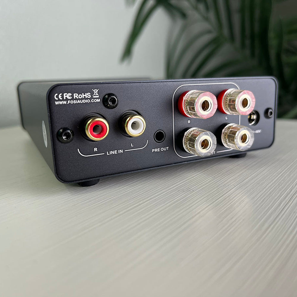 Back of Stereo Amplifier on wooden bench