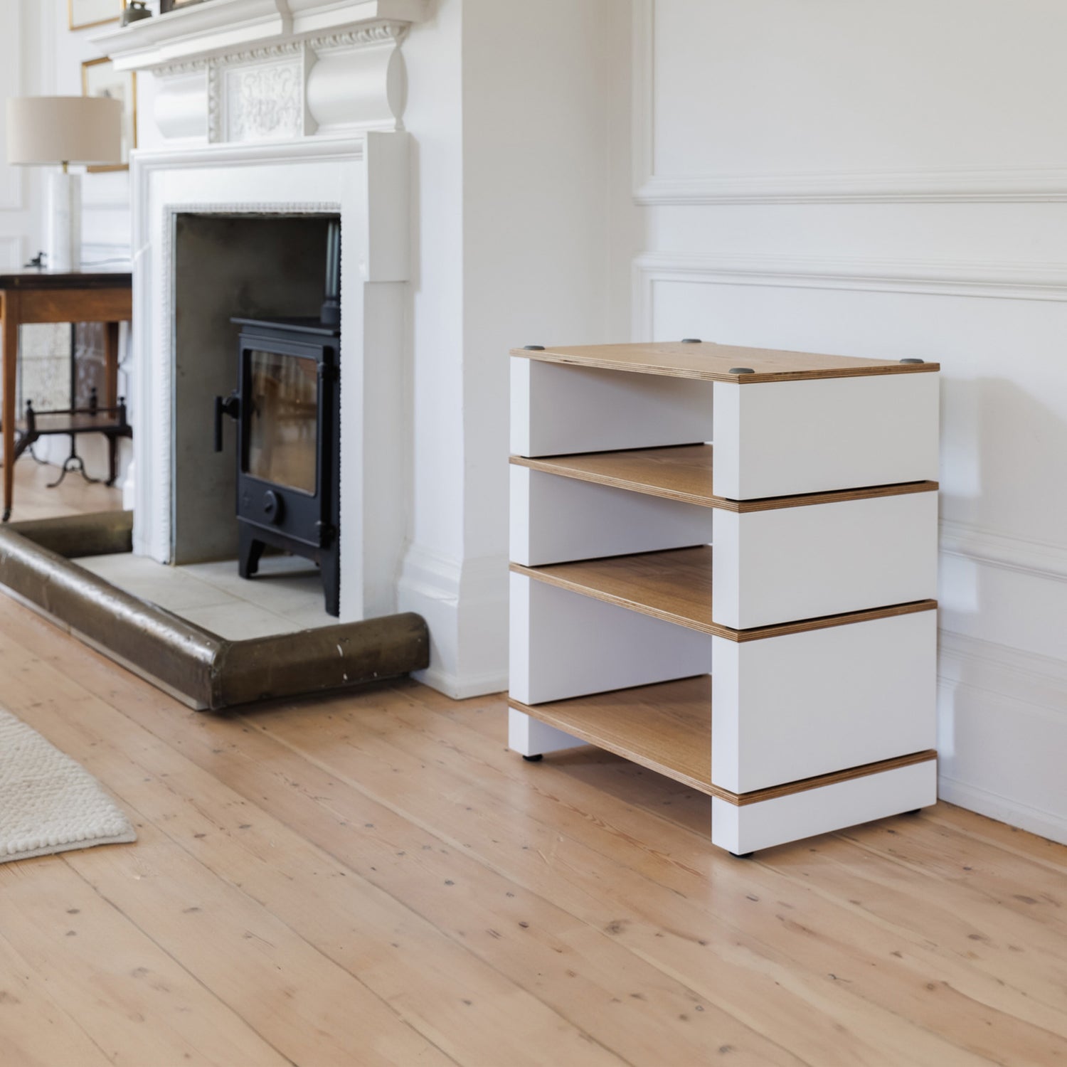 Blok HiFi Stand next to fireplace