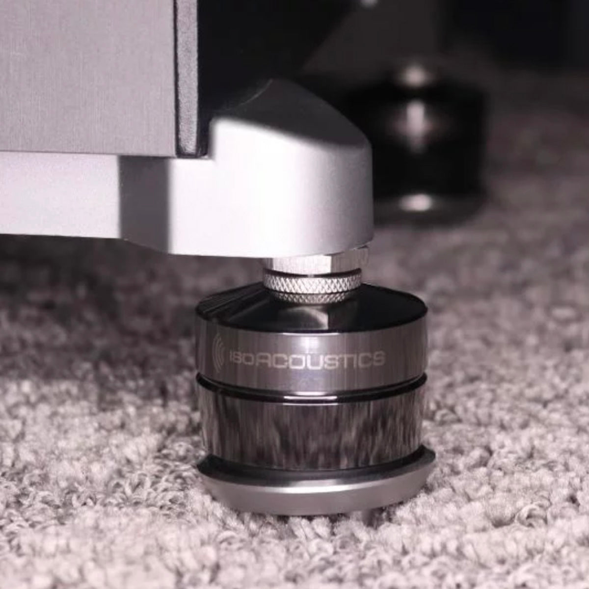 IsoAcoustics Gaia II Carpet Disks - shown on IsoAcoustics feet on carpet