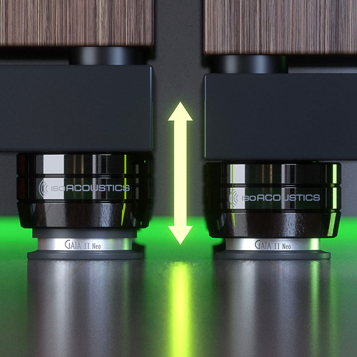 2 black IsoAcoustics Gaia II Neo feet with arrow showing height from ground to speaker