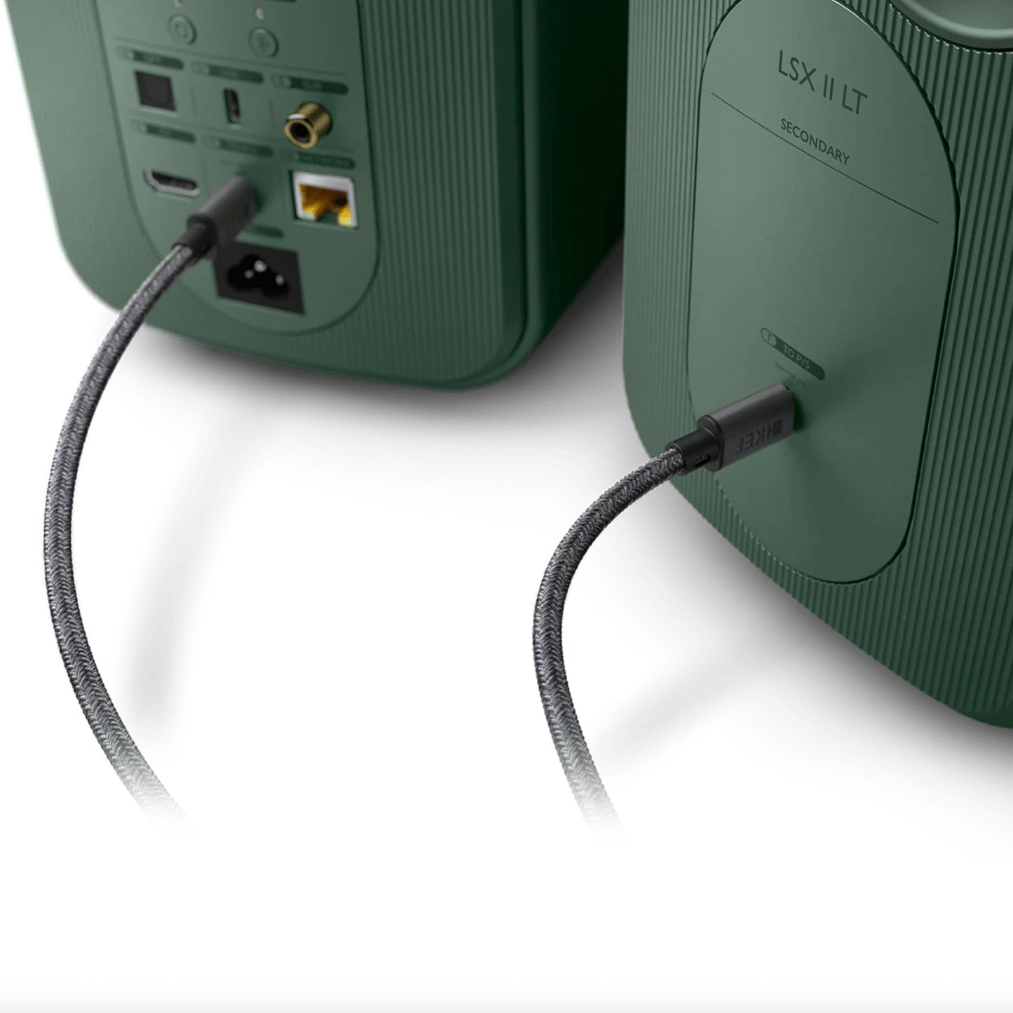 KEF 8 Metre C-Link Interspeaker Cable plugged into back of green LSX II LT