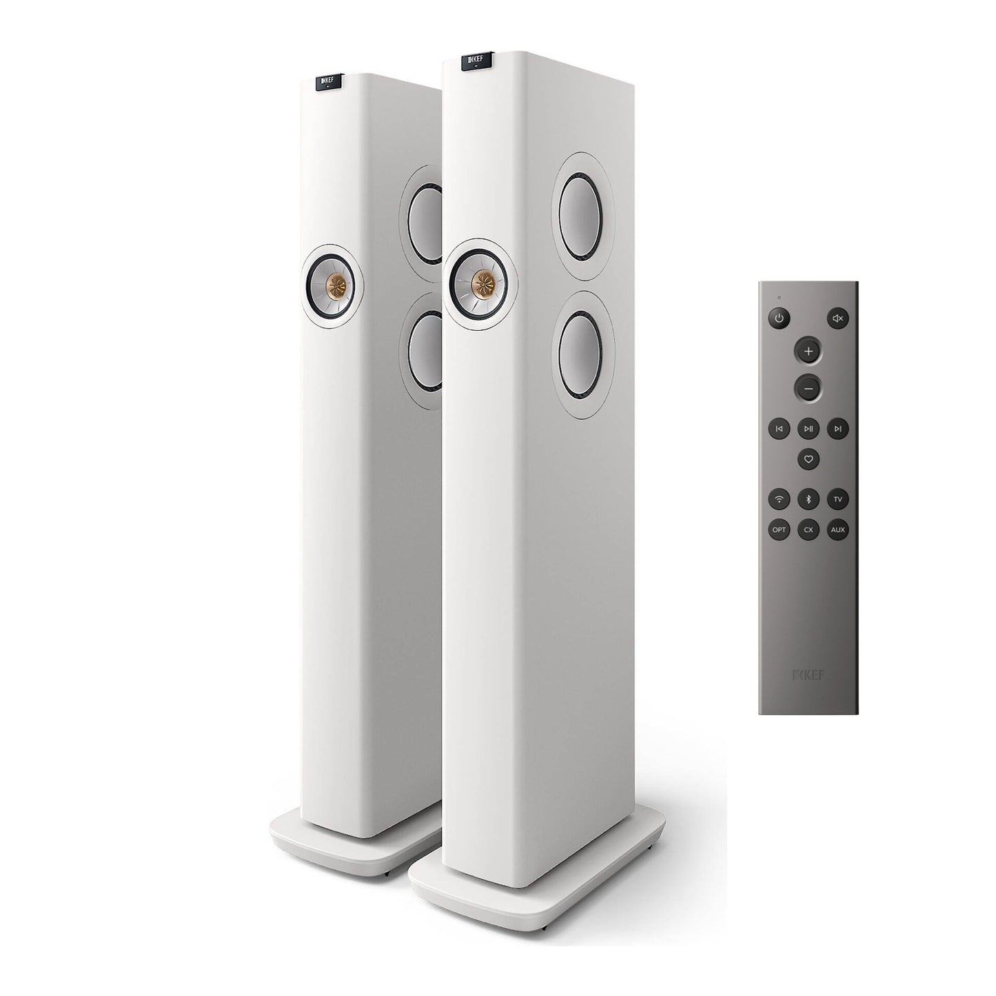 White floor-standing speakers with a remote control on a white background