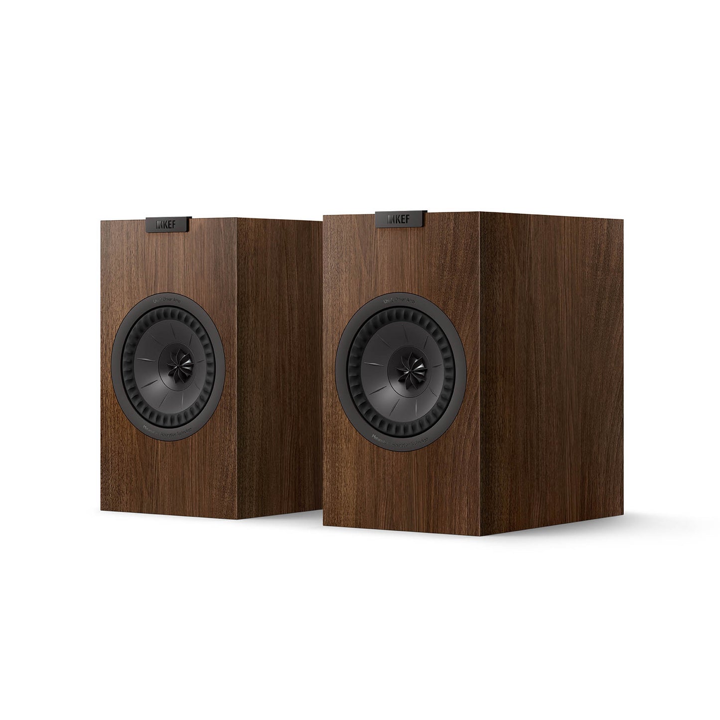 A pair of KEF Q1 Meta speakers in a walnut and visible driver units.