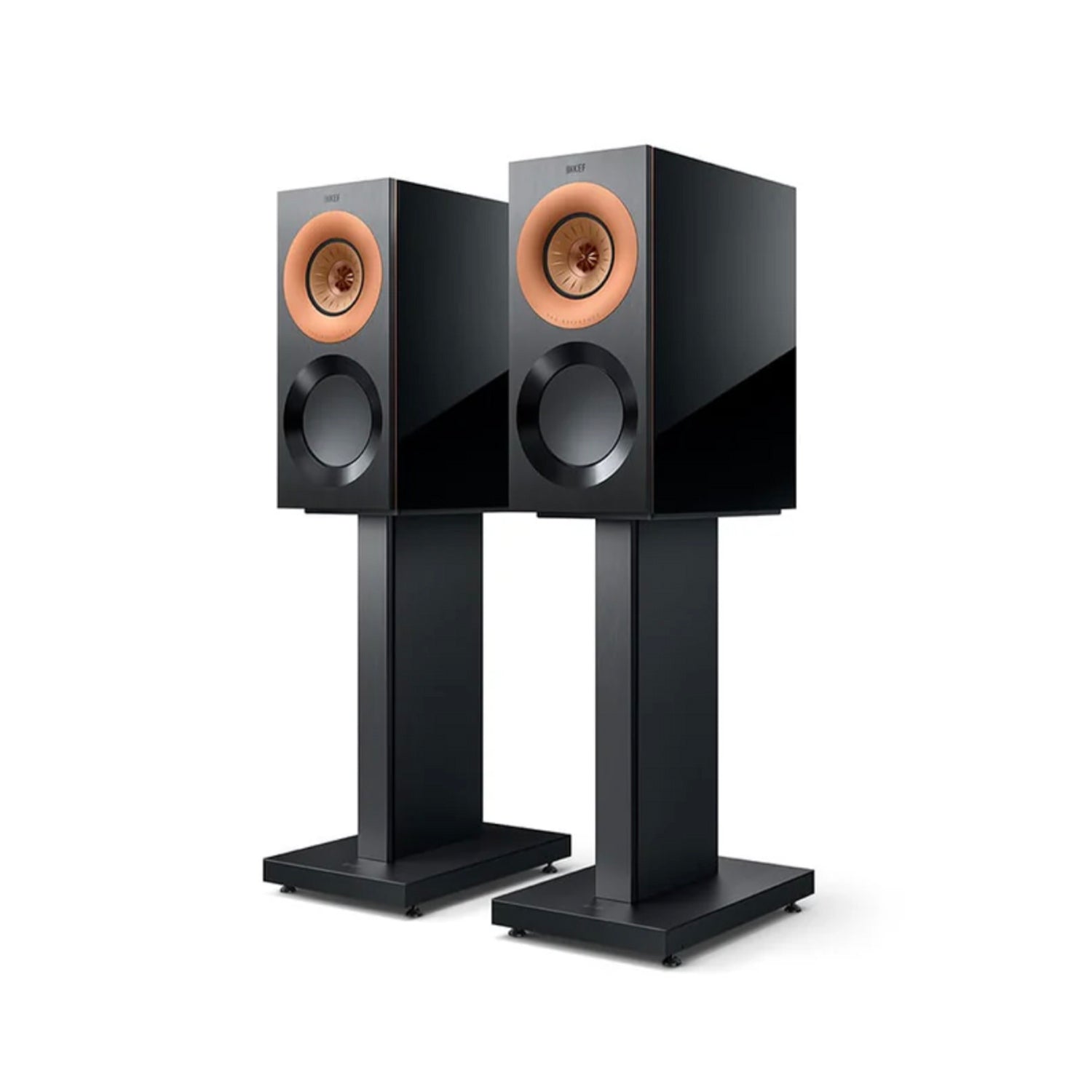 Pair of black KEF Reference 1 speakers on stands with a white background