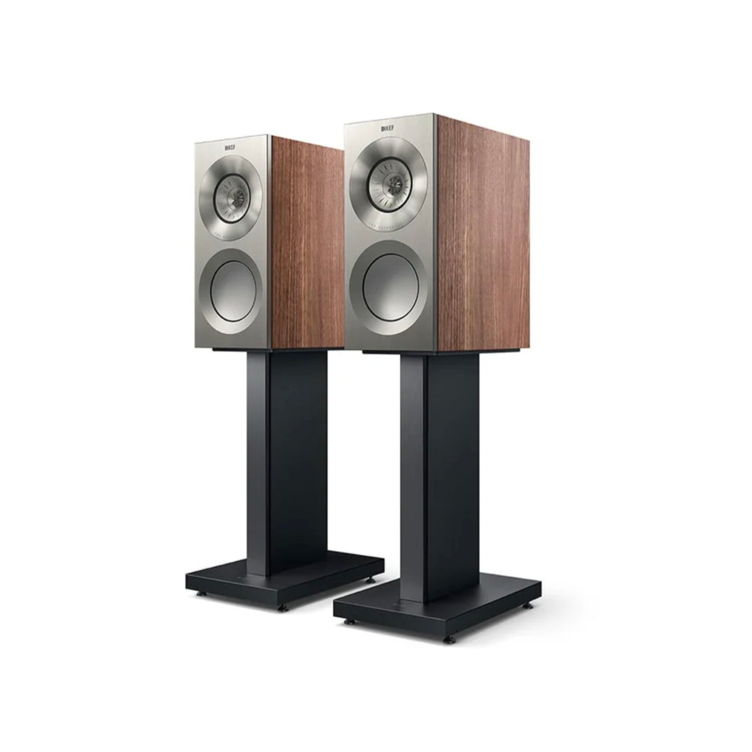 Pair of wooden KEF Reference 1 speakers on stands against a white background
