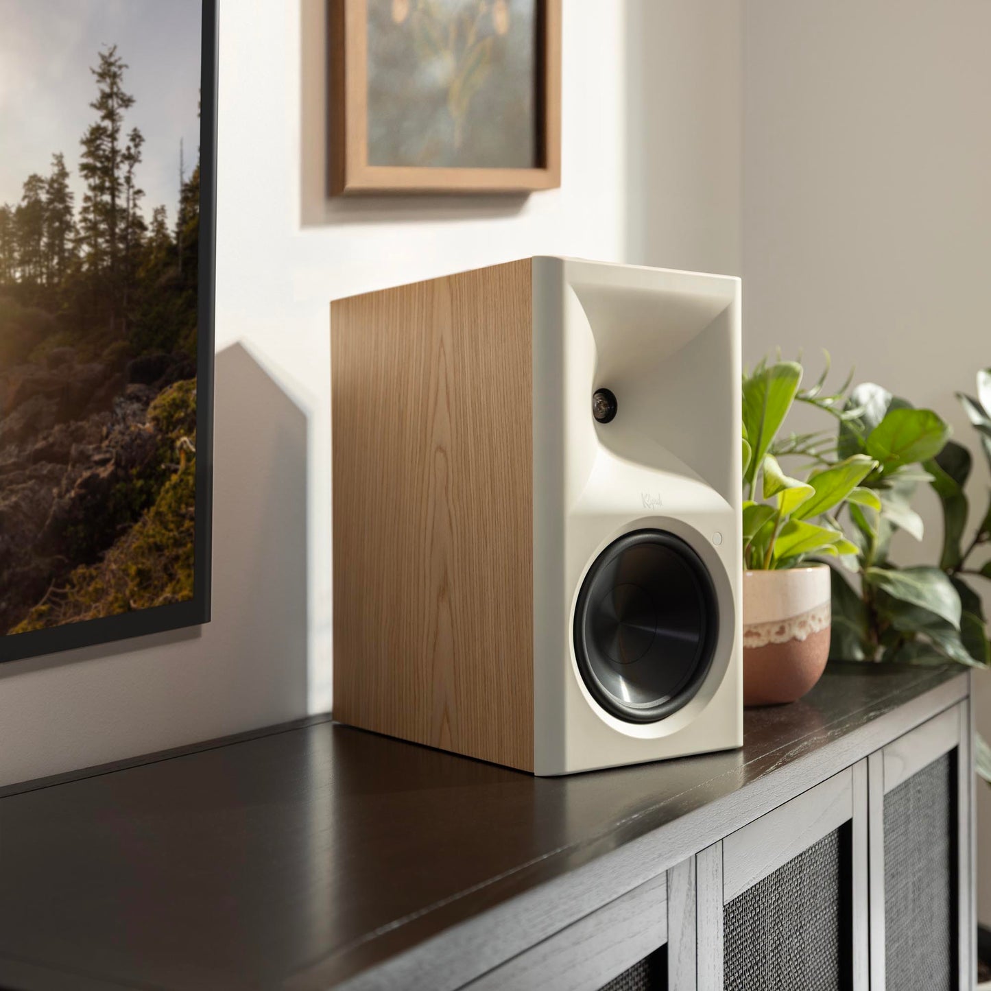 Red oak Klipsch The Sevens II Powered Speakers on timber cabinet