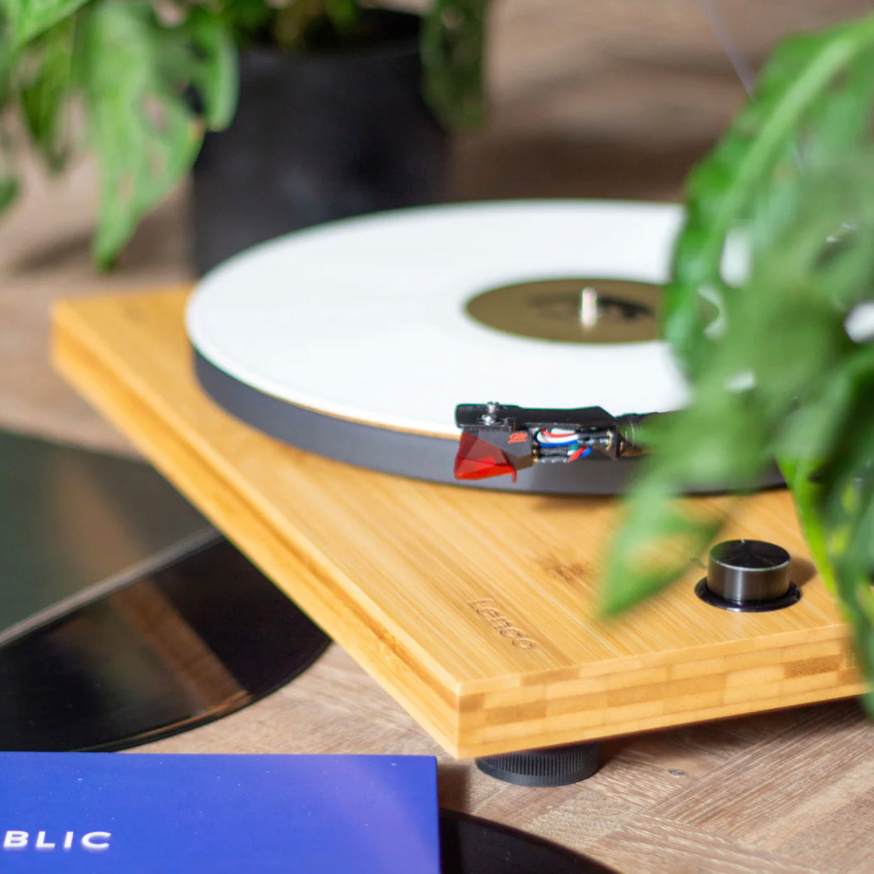 Lenco LBT-335BA Turntable on table next to plants