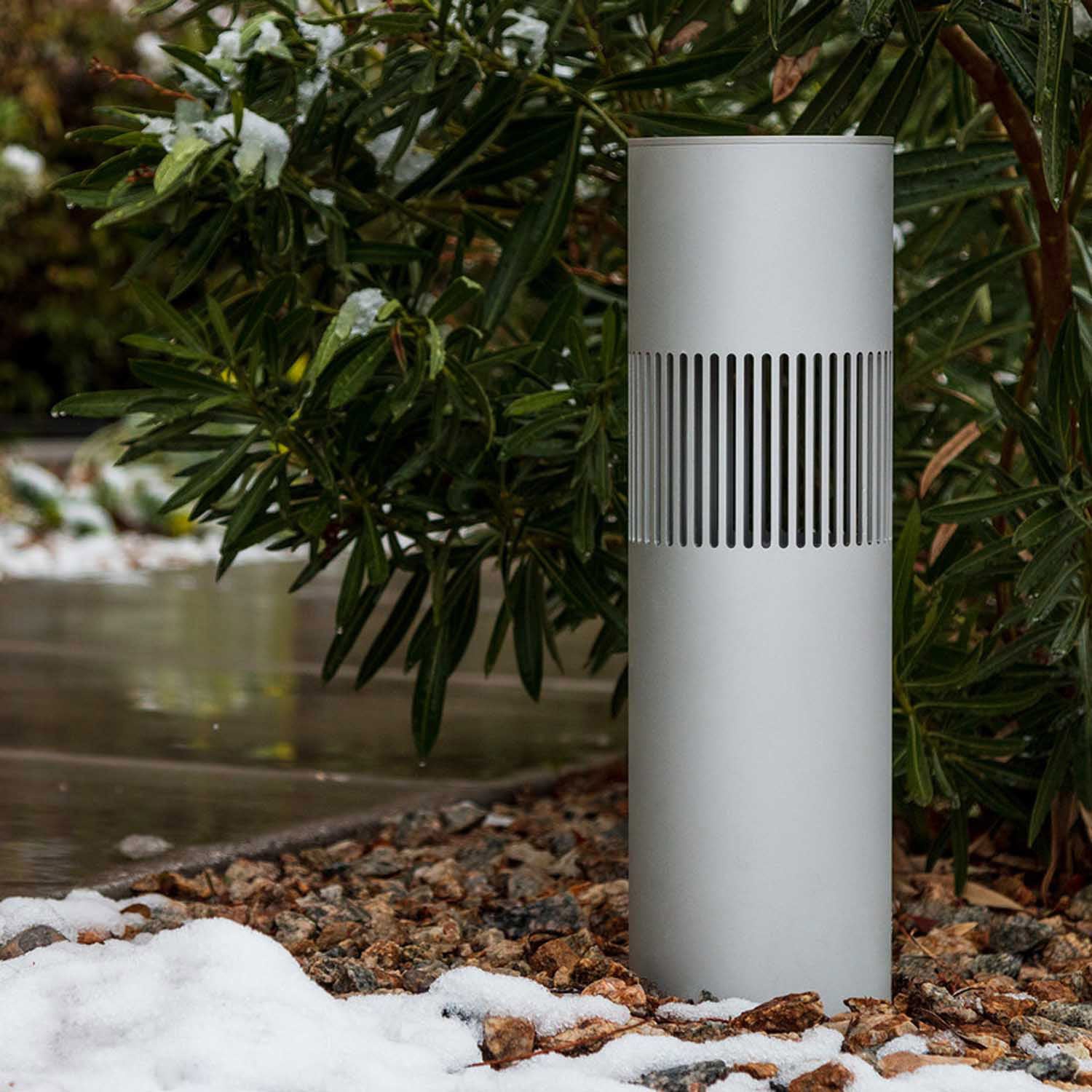 Origin Acoustics bollard speaker in garden next to path