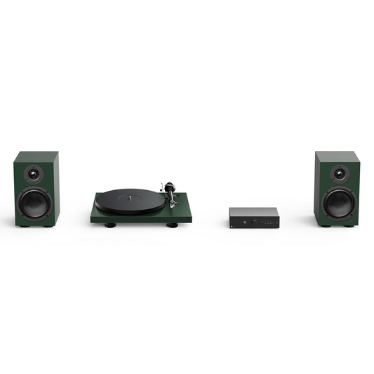 Audio equipment set with speakers and a turntable in green on a white background