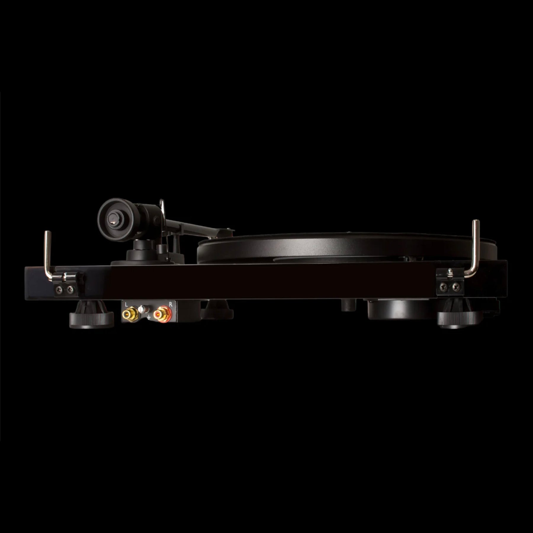 Black turntable on a black background