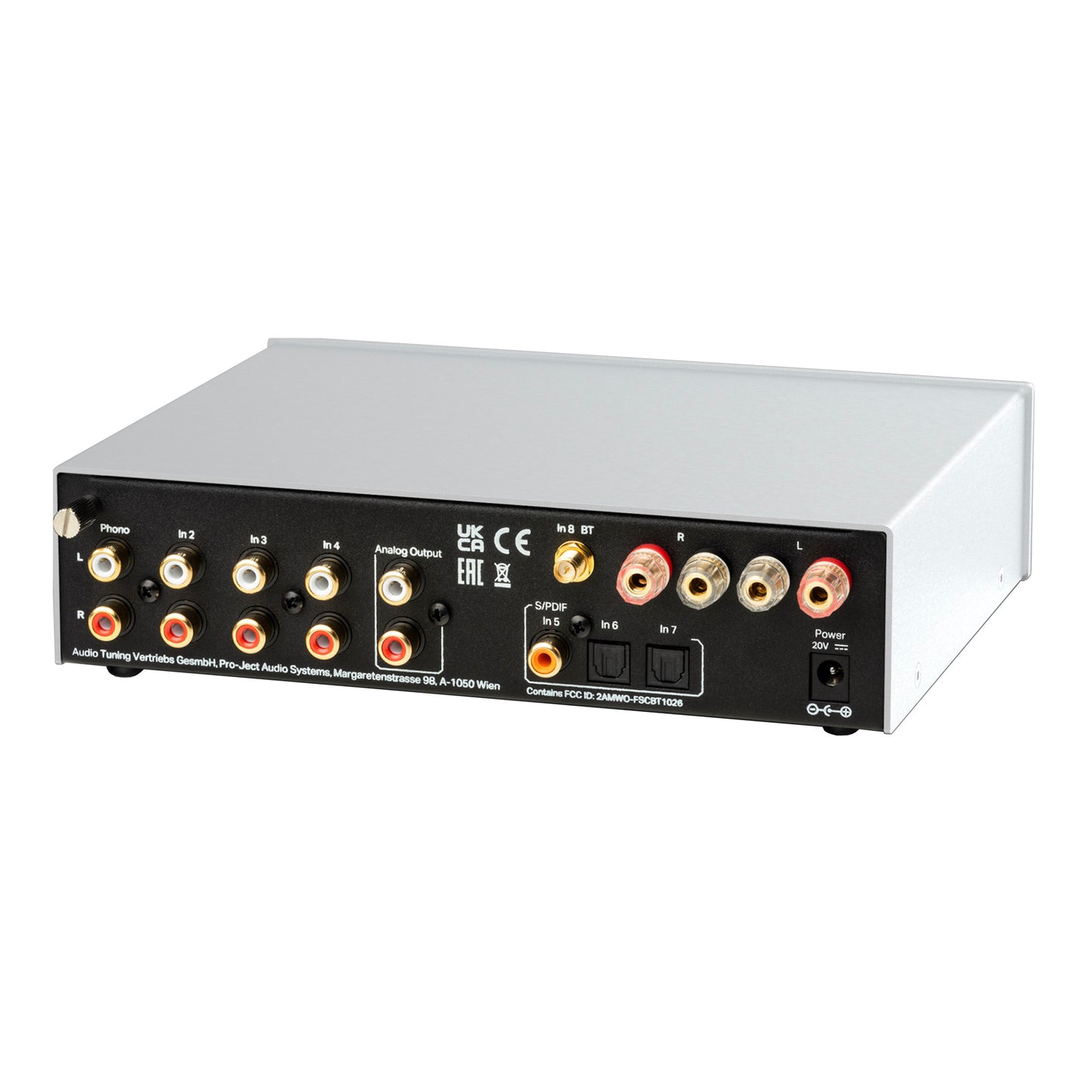 Silver audio amplifier with multiple input and output ports on a white background
