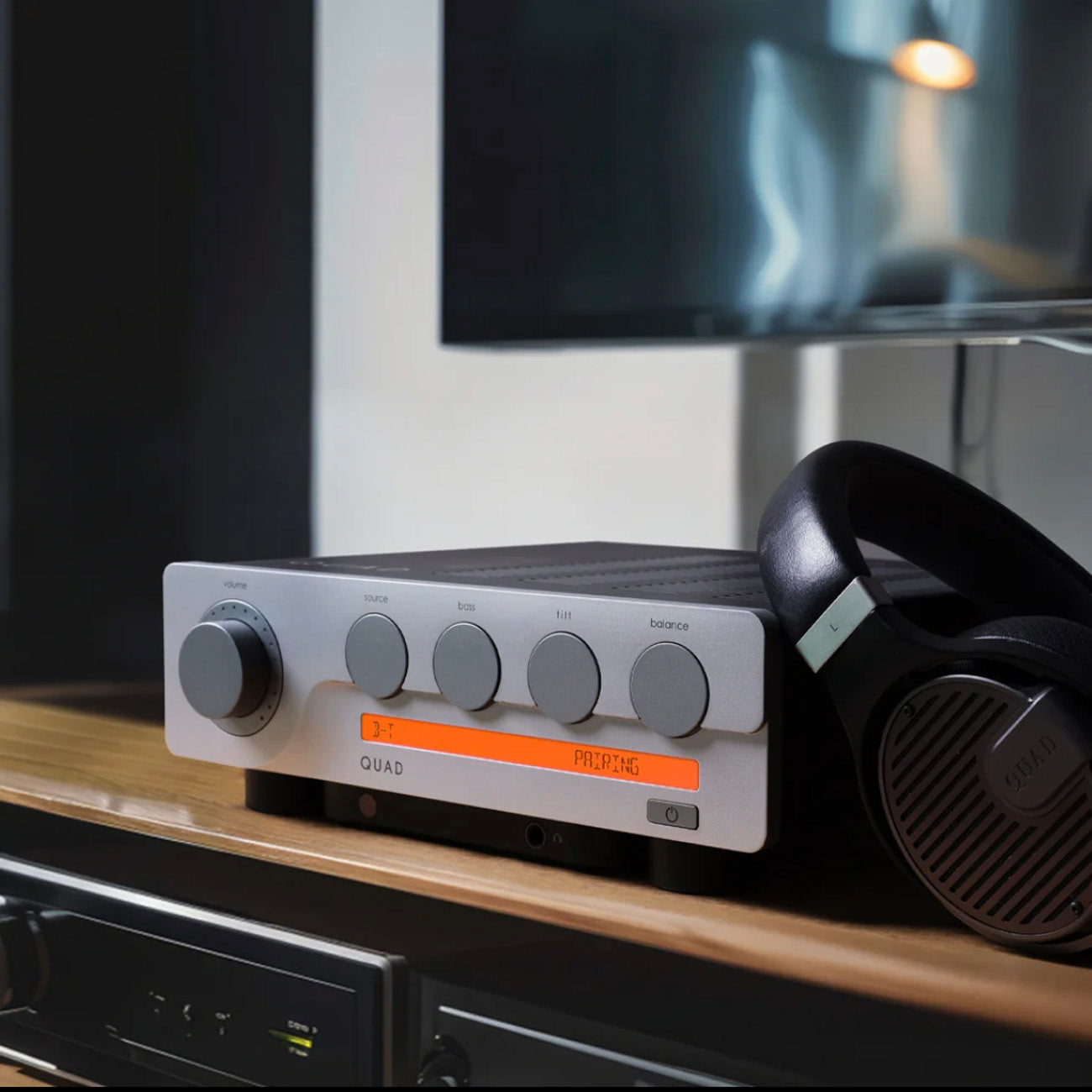 Quad 3 Integrated Amplifier - On shelf with headphones
