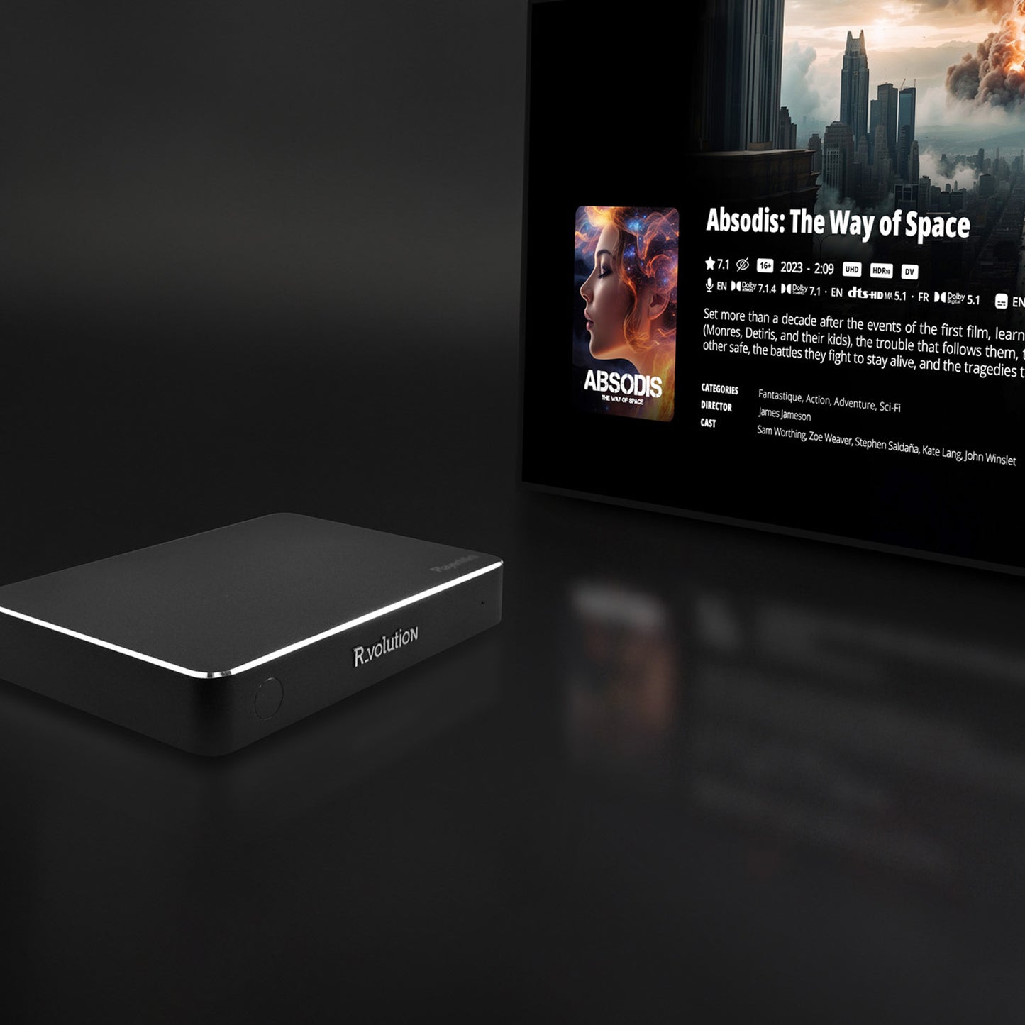 R_volution PlayerMini 4K Ultra HD Media Player next to a screen displaying a movie title.