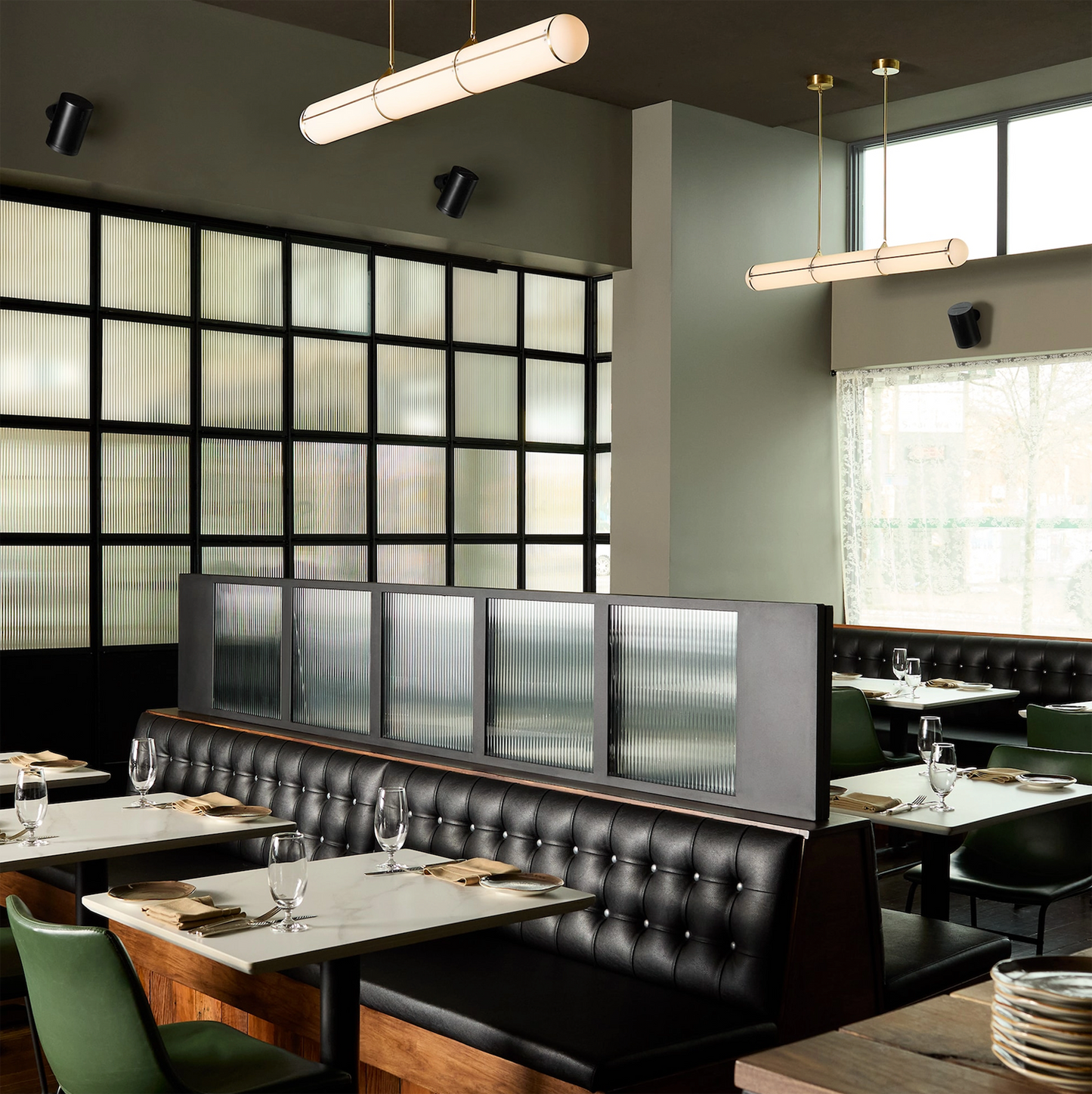 Sonos Era 100 Pro wireless speakers - on display in a restaurant