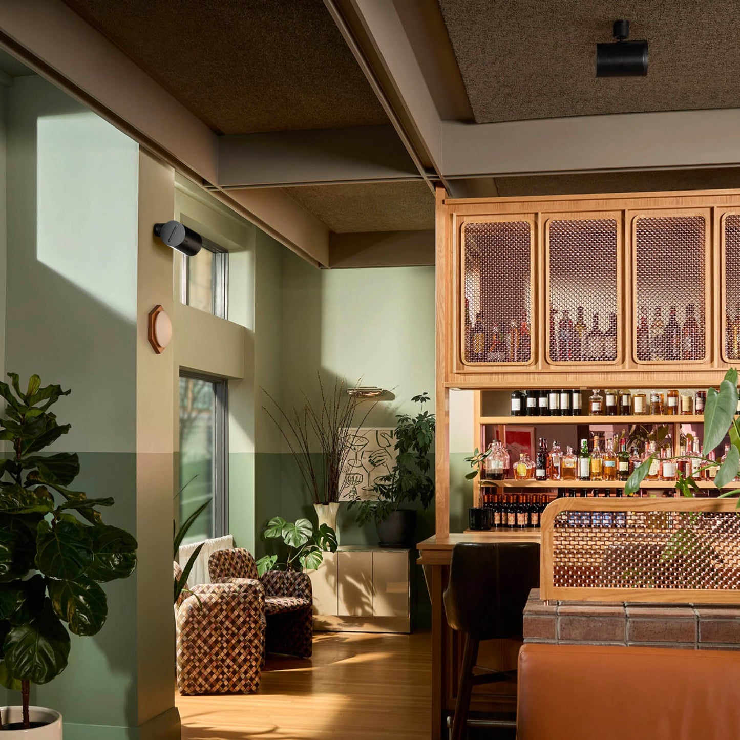 Sonos Era 100 Pro wireless speakers - on display at a bar