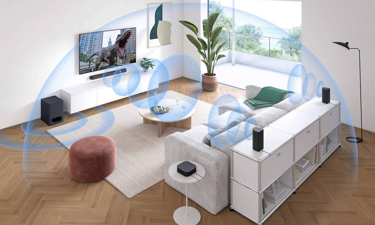 Living room setup with a TV, speakers, and a sofa.