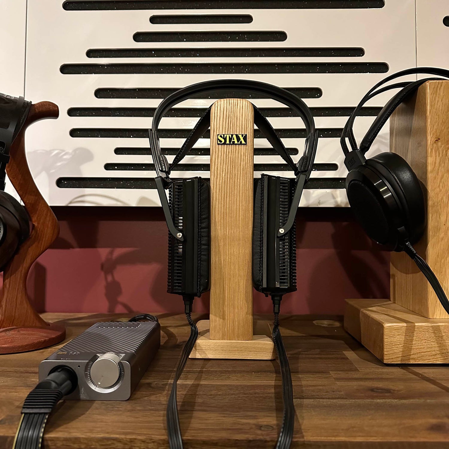 headphones on shelf with headphone amp
