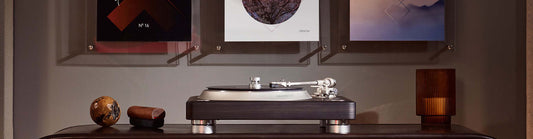 Turntable on table with ornaments surrounding it