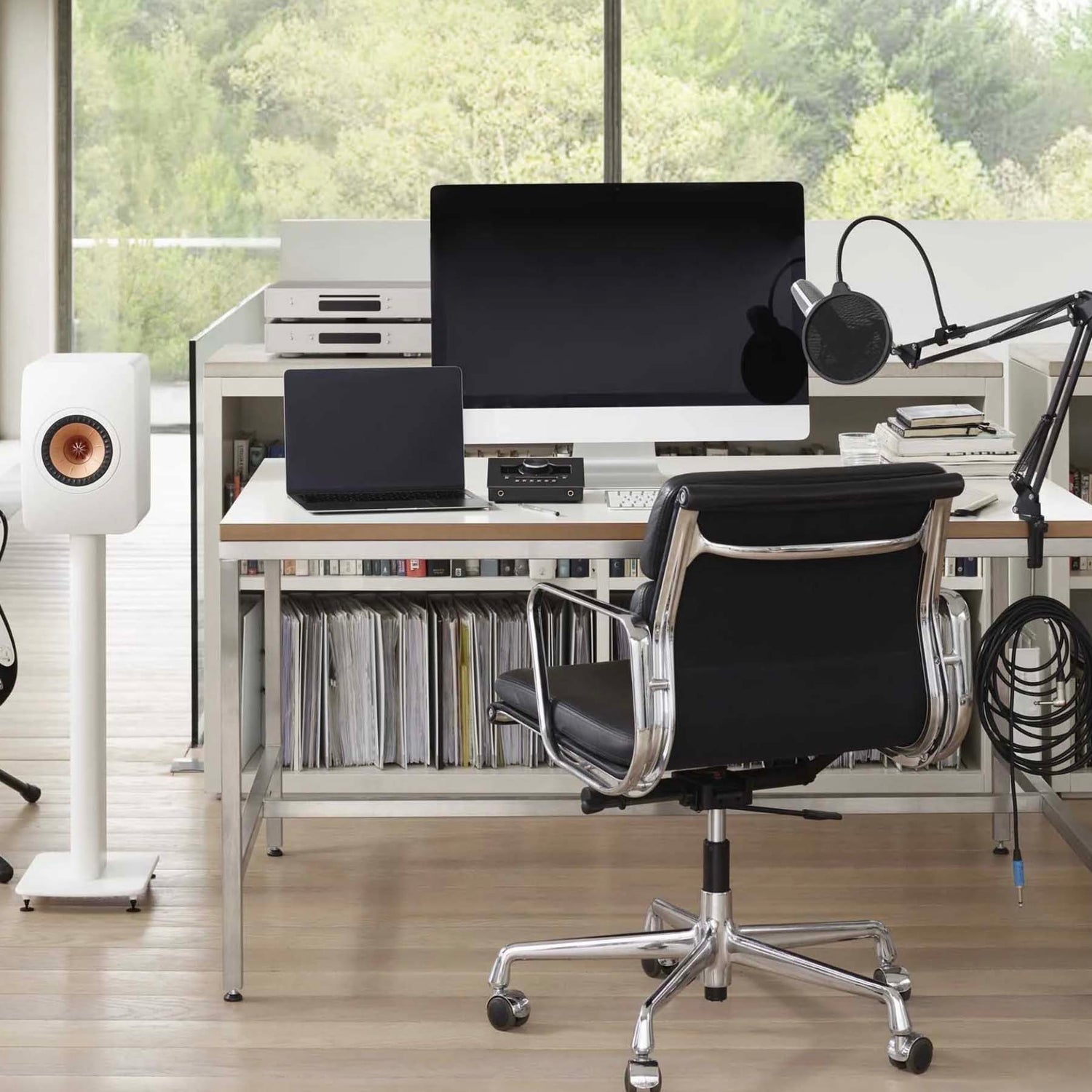 speaker set up next to computer system