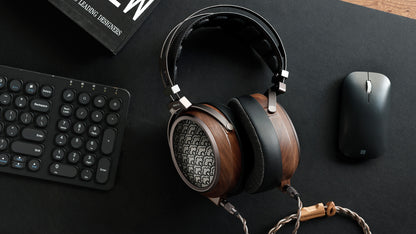 Sivga Egret Planar Magnetic Headphones next to keypad