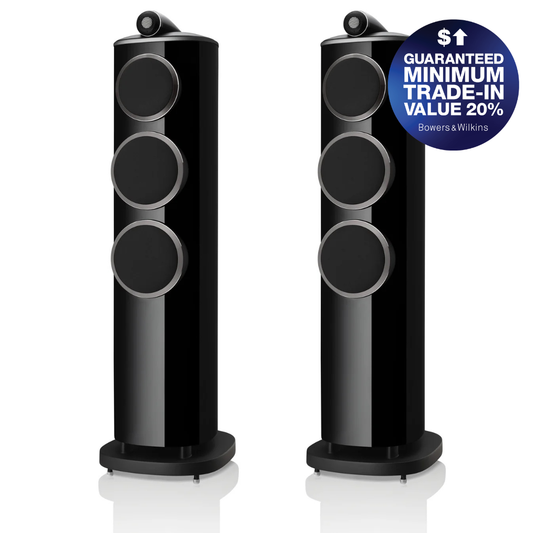 Two black Bowers & Wilkins floorstanding speakers shown side by side on a white background, with a blue promotional badge in the top right corner.
