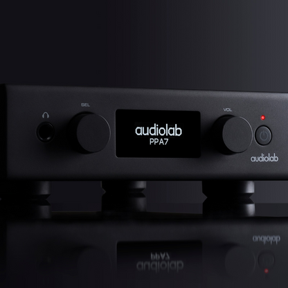 Close up of black Audiolab PPA7 Phono Preamplifier on black background