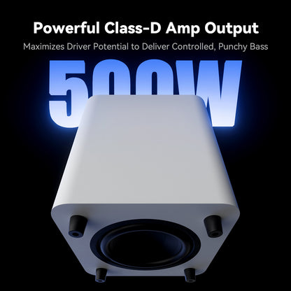 A white subwoofer shown from the front on a black background, with large blue text reading 500W and smaller text above saying 'Powerful Class-D Amp Output' and 'Maximizes Driver Potential to Deliver Controlled, Punchy Bass.'.