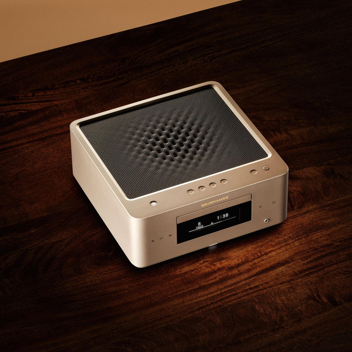 Marantz MCR-60N Compact All-In-One Hi-Fi System in silver sitting on dark timber top