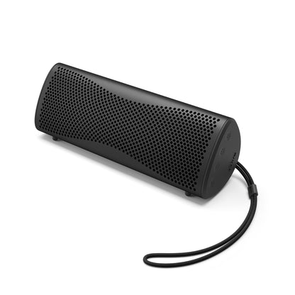 Black portable speaker with a strap on a white background