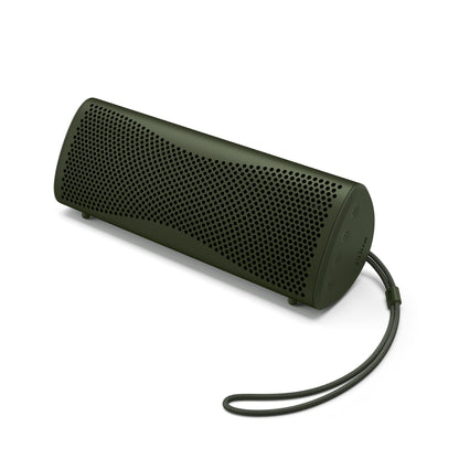 Green portable speaker with a strap on a white background
