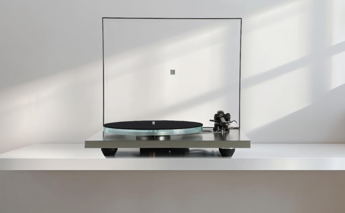 Turntable on a white surface with a minimalist design