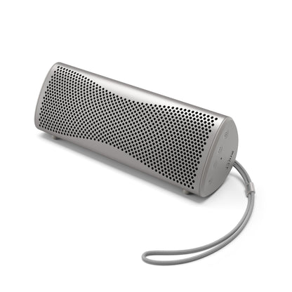 Portable speaker with a cable on a white background