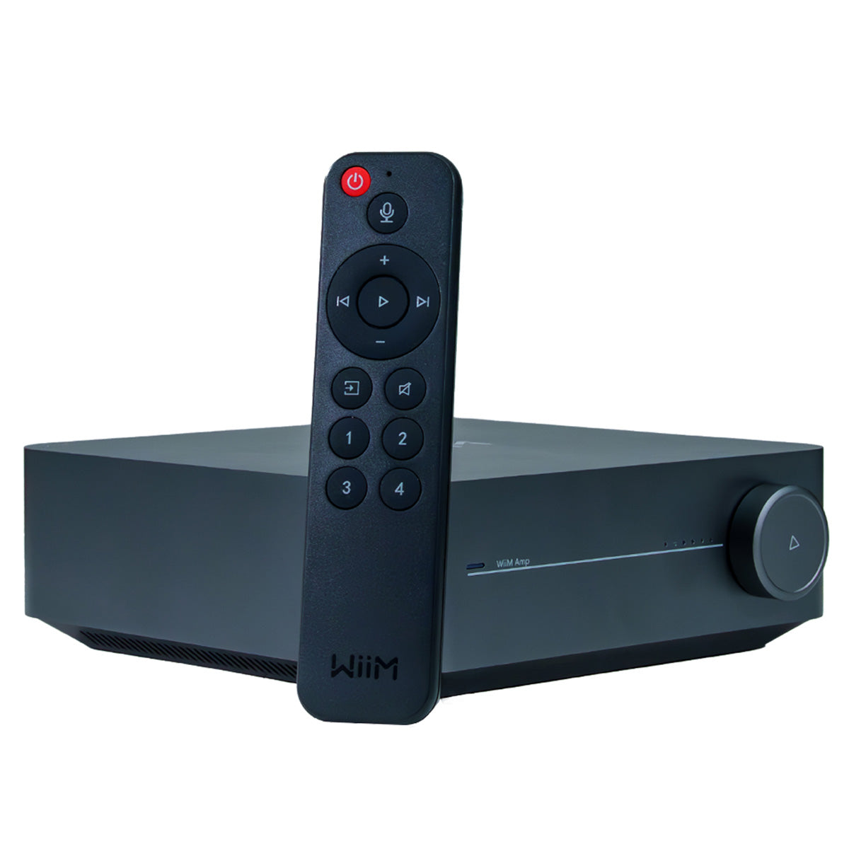 WiiM Amp and remote control on white background