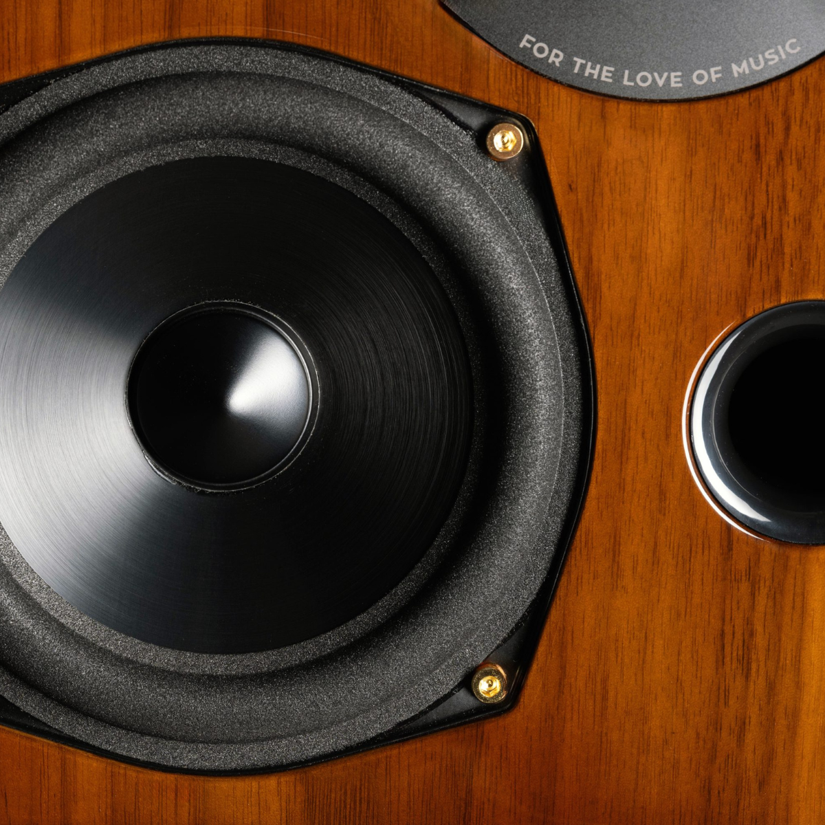 Close up of gloss walnutAcoustic Energy AE2 40th Anniversary Bookshelf Speaker
