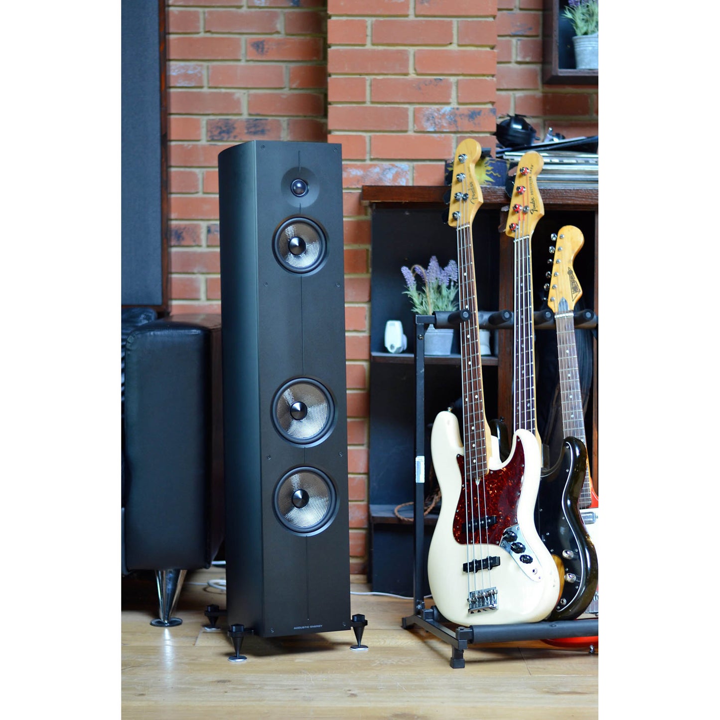 Black Acoustic Energy Corinium Speakers next two electic guitars
