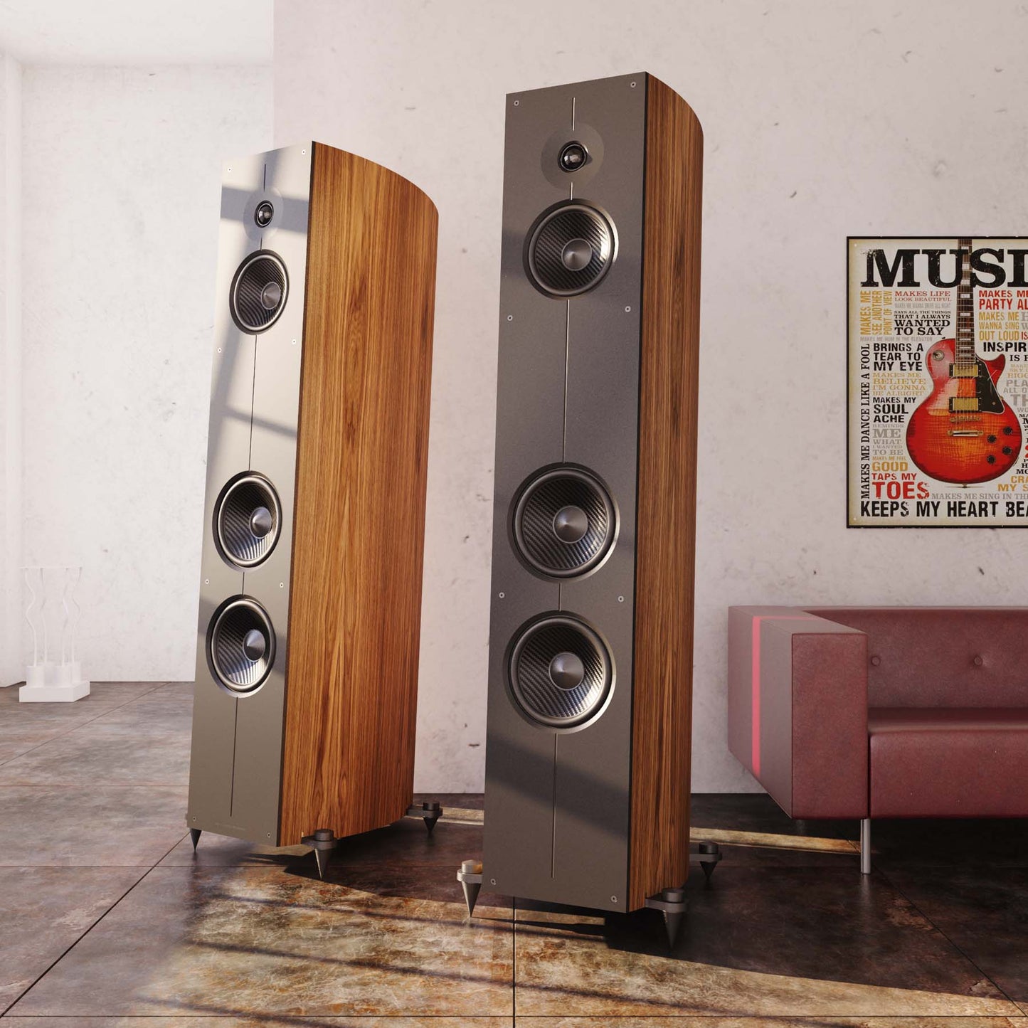 Two tall floor-standing speakers in a room with a poster and sofa.