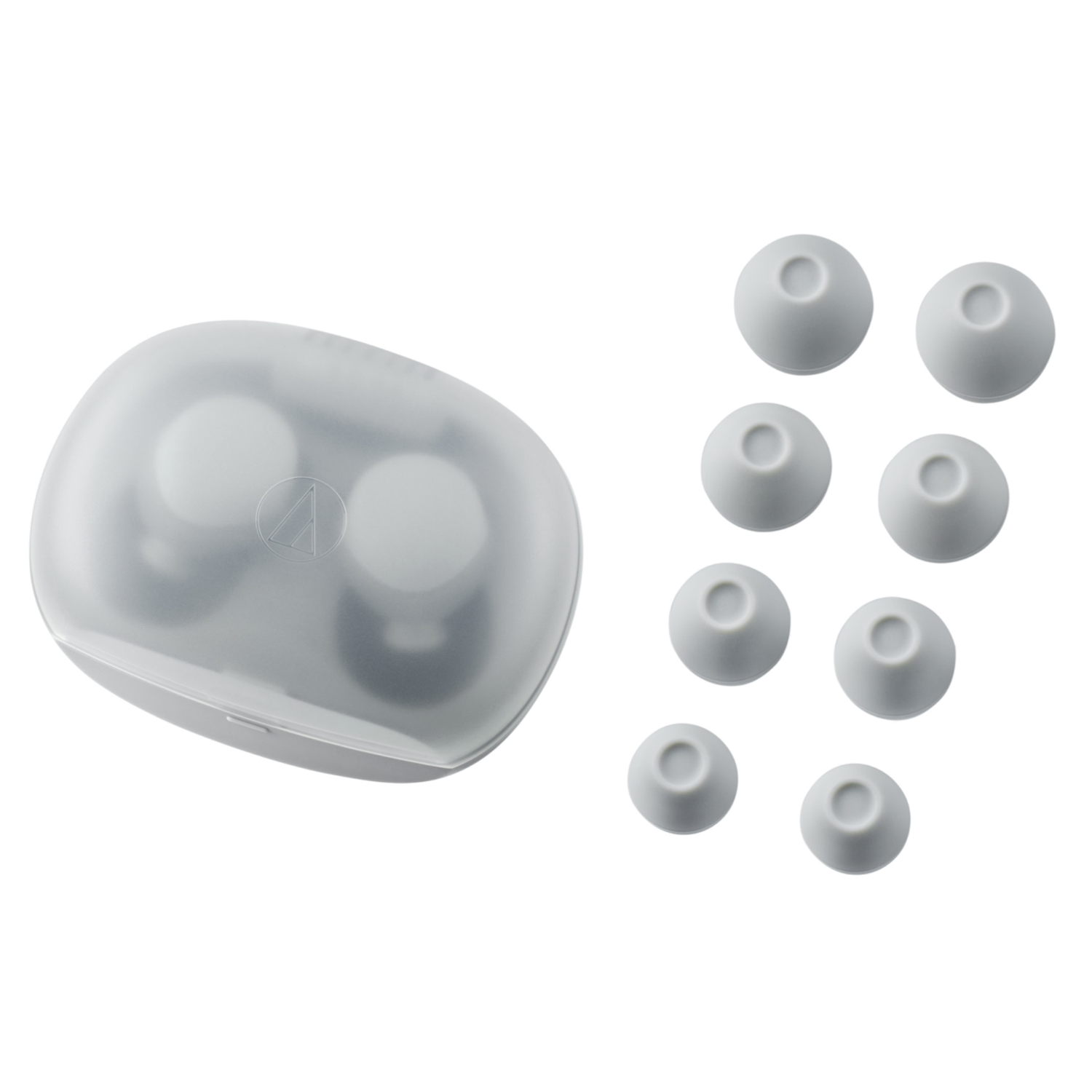 Grey earbud case with multiple eartips on a white background