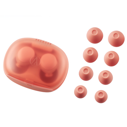 Coral earbud case with multiple ear tips on a white background