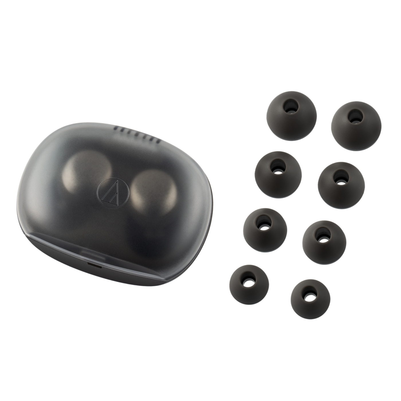 Black earbud case with multiple earbud tips on a white background