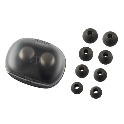 Black earbud case with multiple earbud tips on a white background