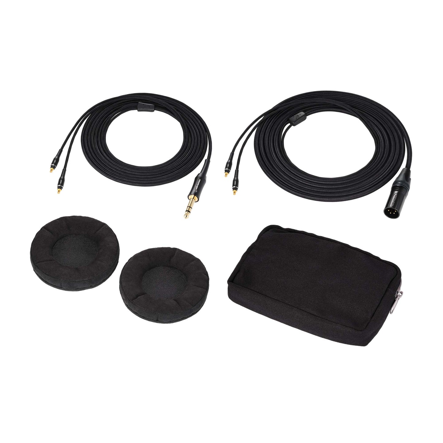 Set of black earbud covers, cables, and a carrying case on a white background