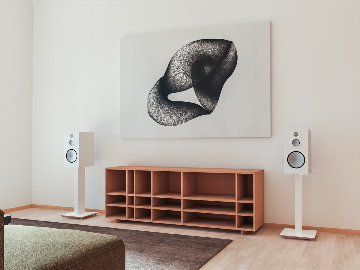 Pair of white Blok Axis 600mm Stands with artwork on wall and timber cabinet