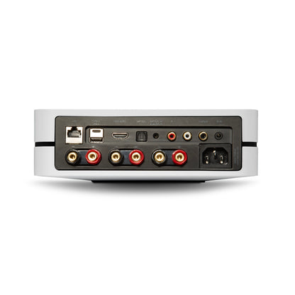 Back view of a white Bluesound Powernode Streaming Amplifier with various ports on a white background