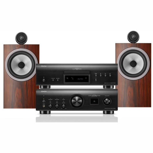 Audio system with wooden speakers and black receiver on a white background
